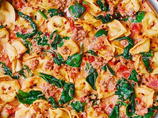 Creamy Sausage Tortellini with Spinach, Tomatoes and Mozzarella Cheese Sauce