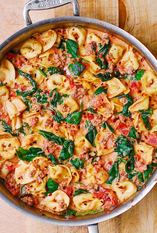 Creamy Sausage Tortellini with Spinach, Tomatoes and Mozzarella Cheese Sauce